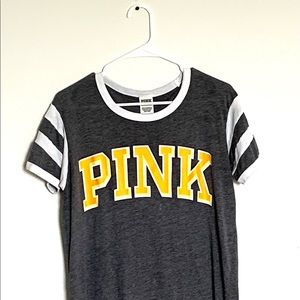 Grey and white with yellow words shirt